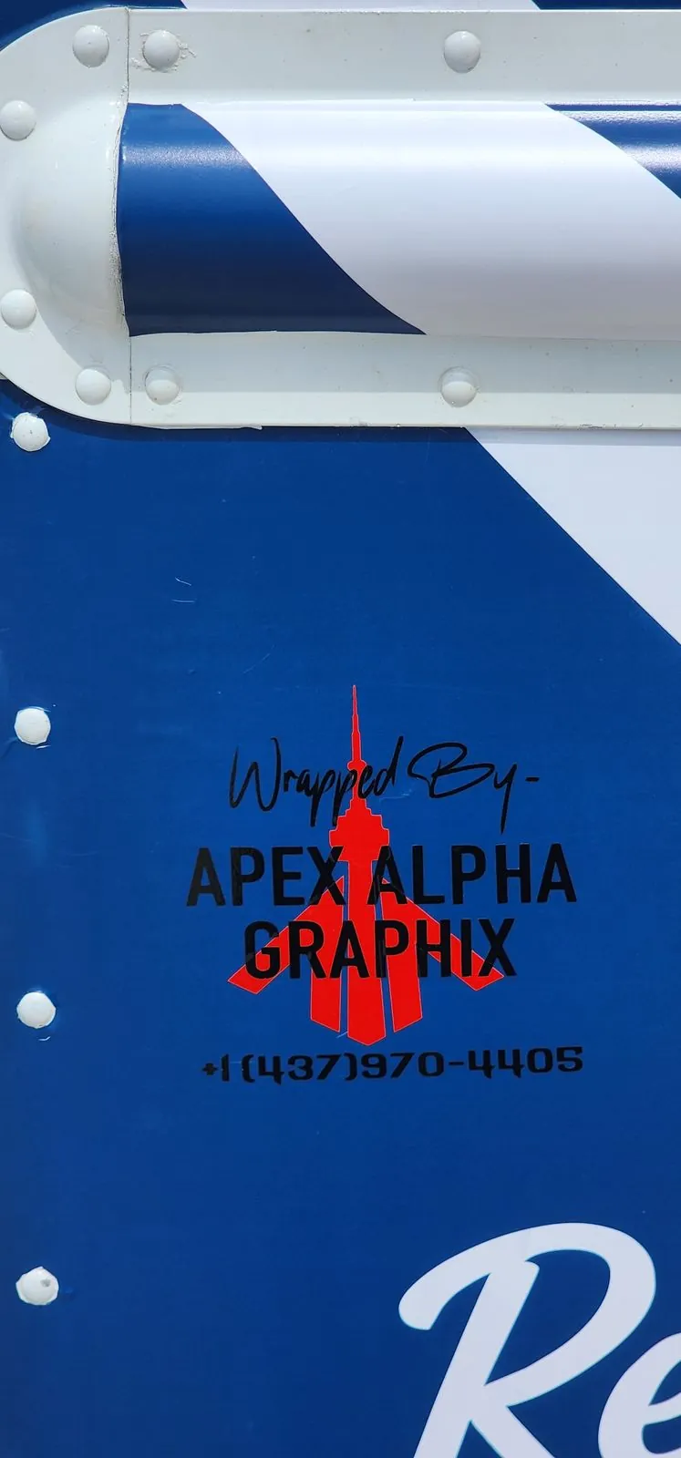 Wrapped by Apex Alpha Graphix credit decal on the food truck